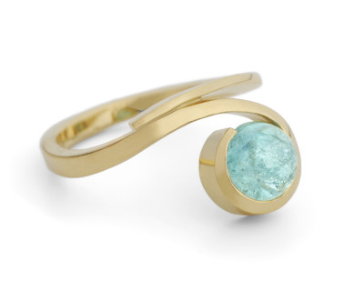 18 carat forged gold ring with paraiba tourmaline