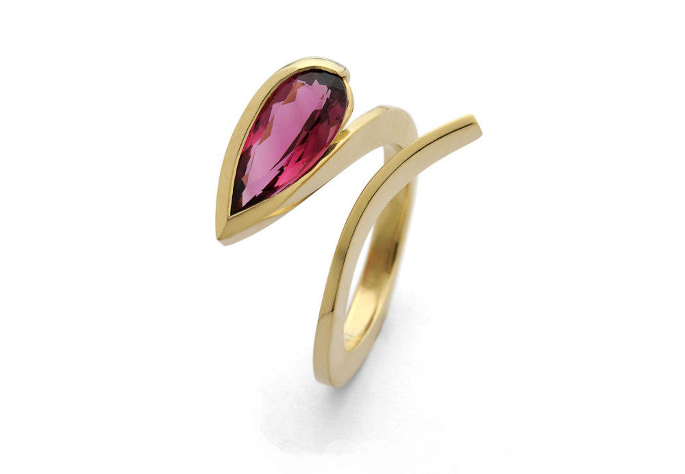 18 carat forged gold ring with pear shaped rubellite tourmaline
