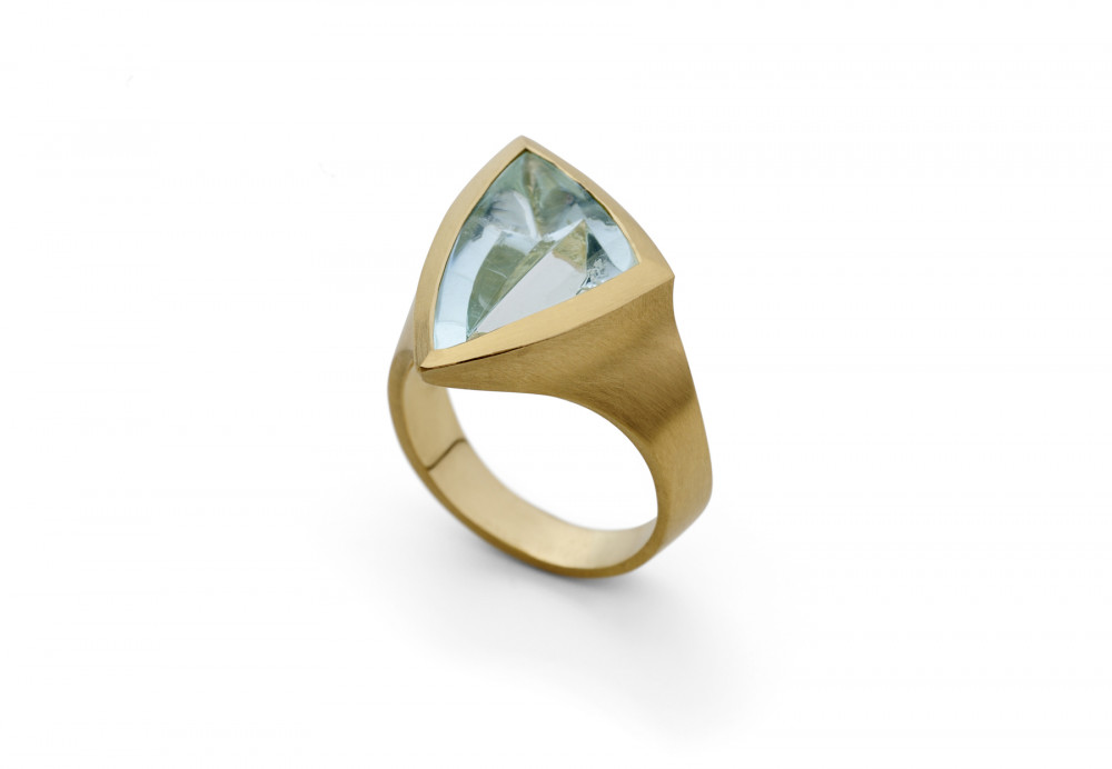 Large carved gold cocktail ring with aquamarine