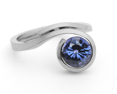Forged white gold and blue spinel dress ring