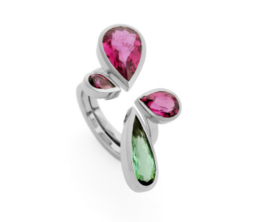 18 carat white gold rings with rubellite and green tourmaline and grape garnet