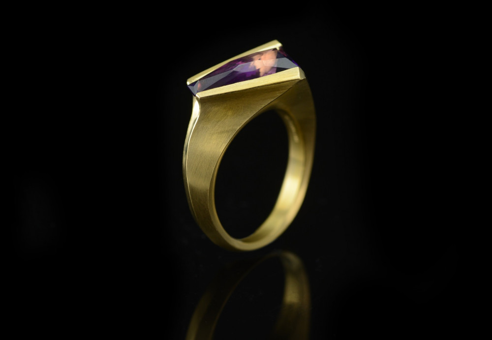 Hand carved gold cocktail ring with amethyst