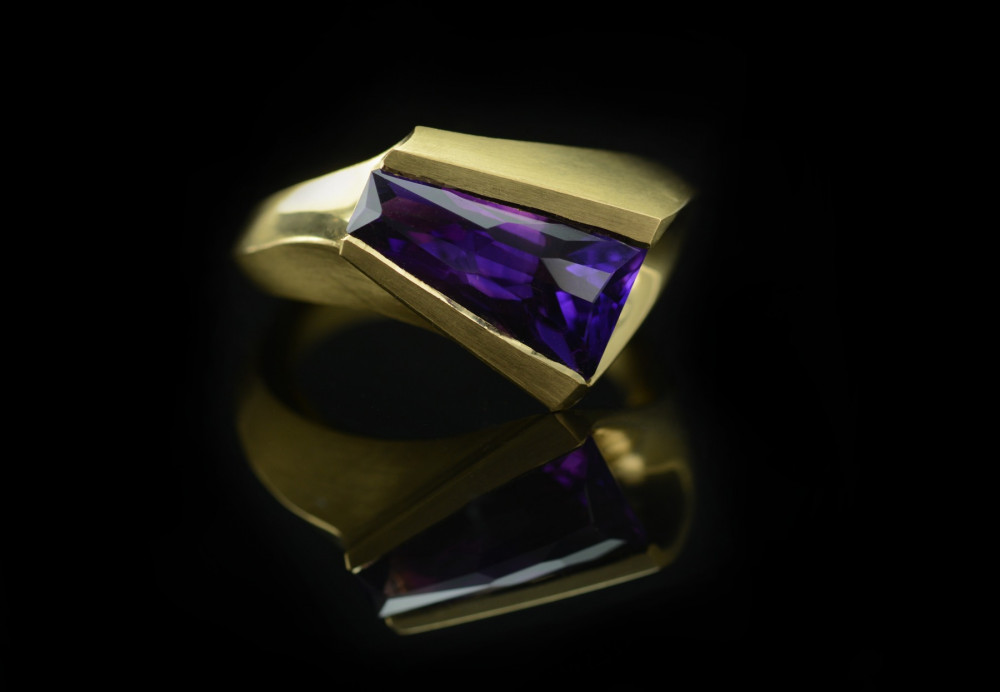 Hand carved gold cocktail ring with amethyst