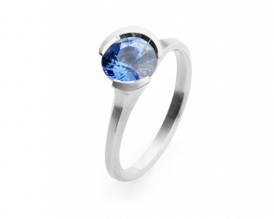 Arris modern platinum engagement ring with round blue sapphire