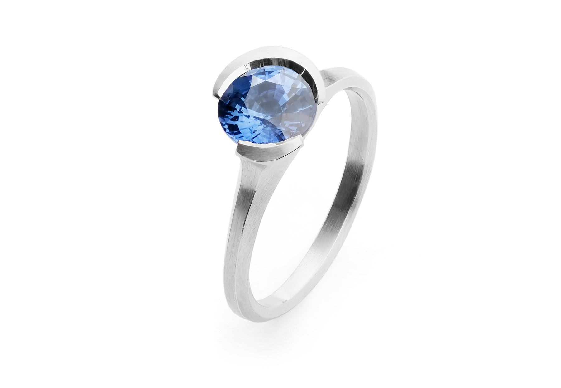 Arris modern platinum engagement ring with round blue sapphire