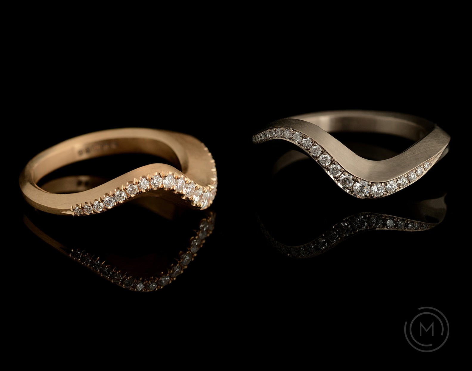 Arris carved white and rose gold diamond wedding rings