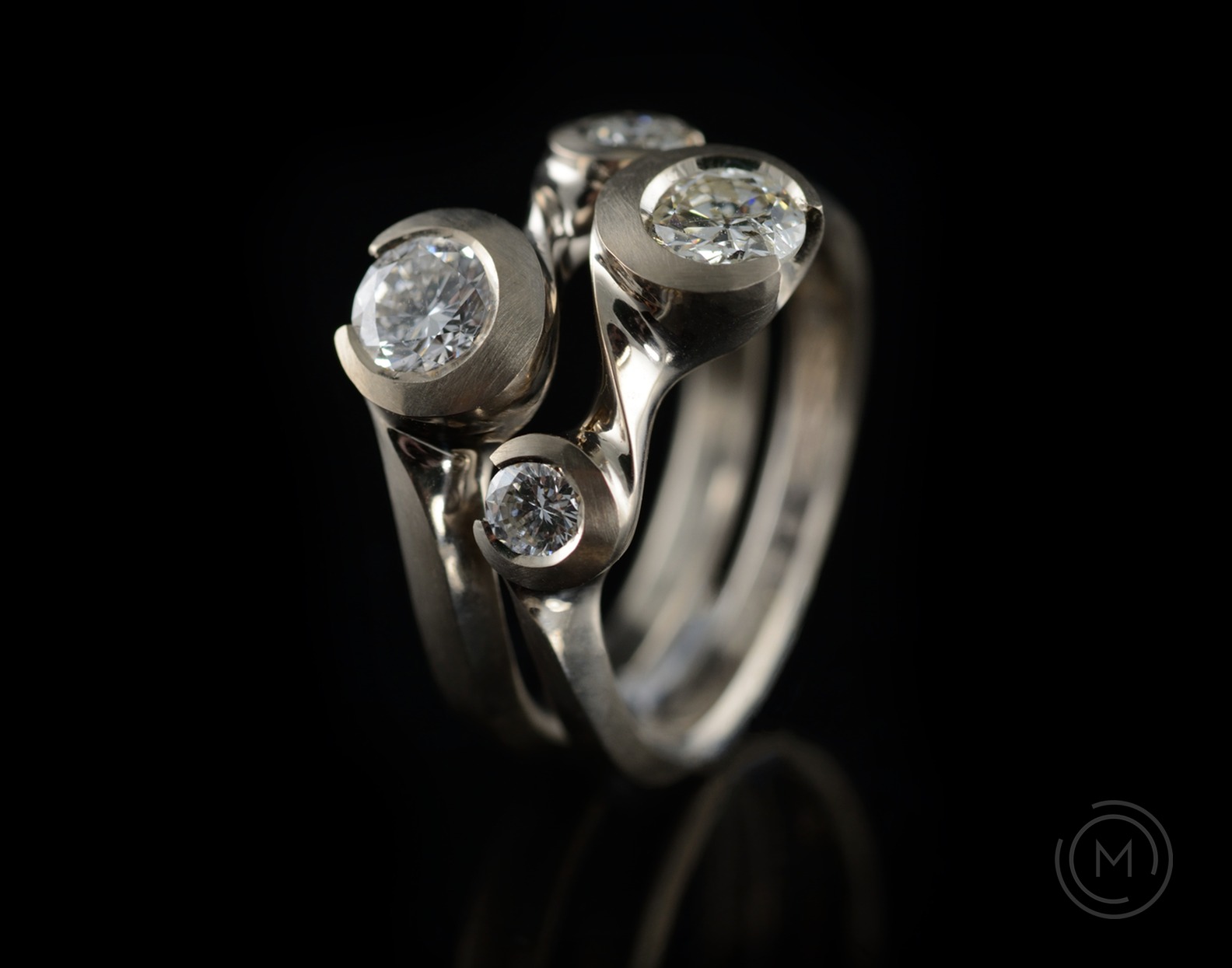 Arris organic carved white gold and diamond rings