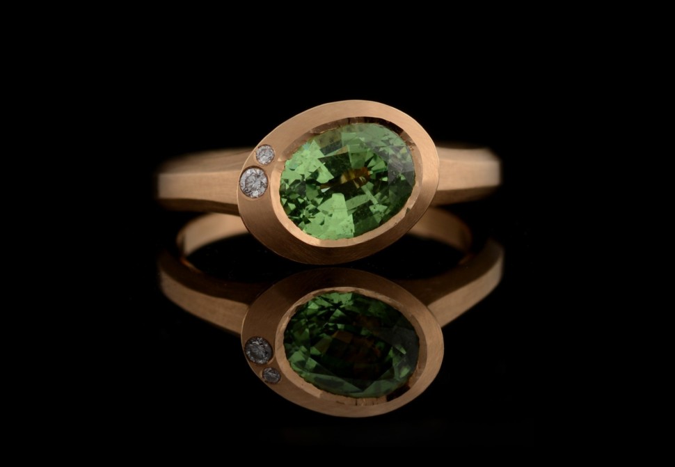 Rose gold Arris ring with oval tsavorite garnet and white diamonds