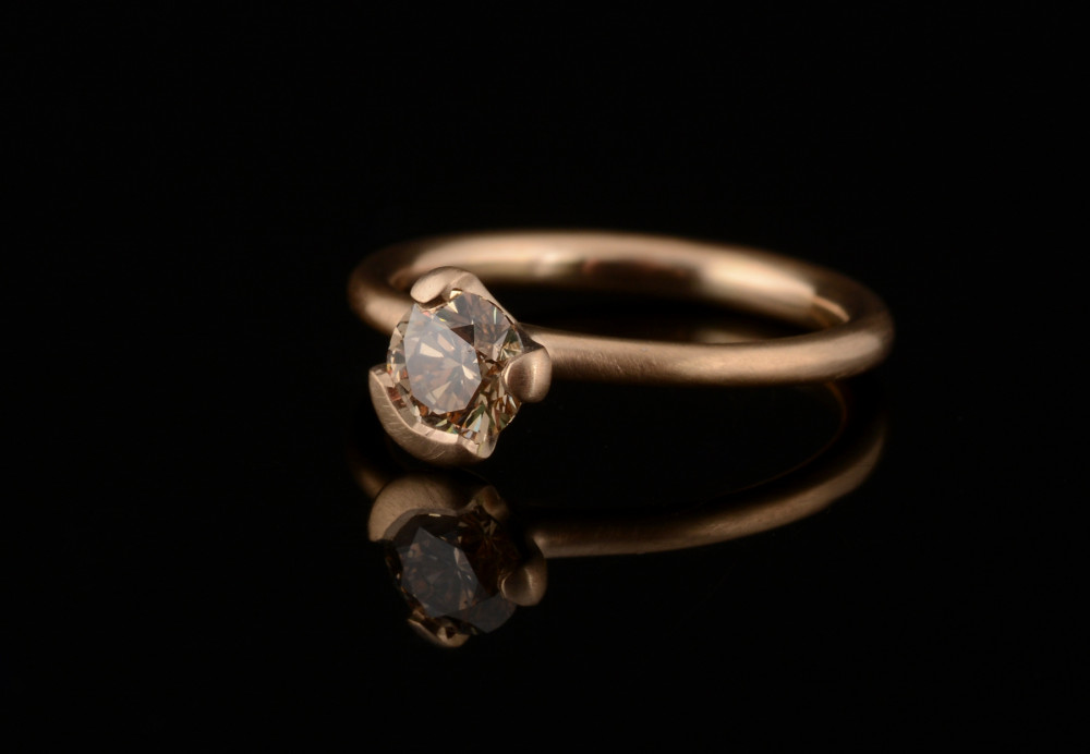 Cognac diamond and rose gold asymmetric claw engagement ring