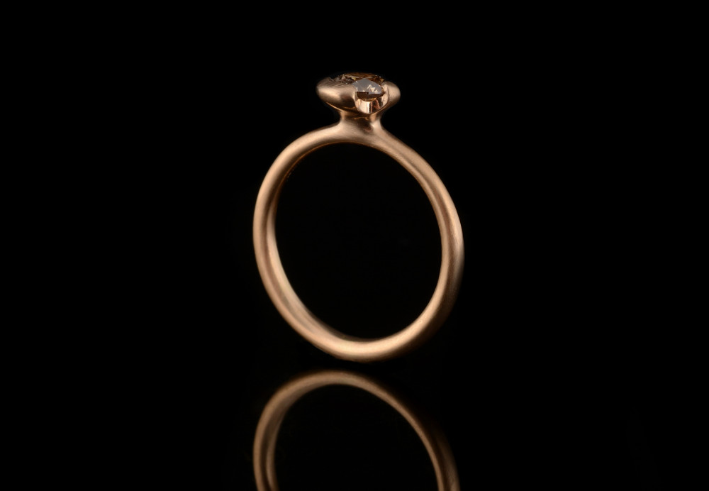 Cognac diamond and 18-carat rose gold asymmetric claw engagement ring