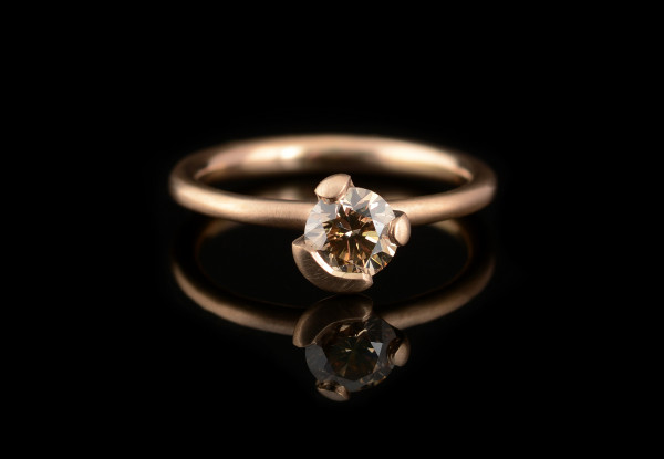 Cognac diamond 18-carat rose gold asymmetric claw engagement ring