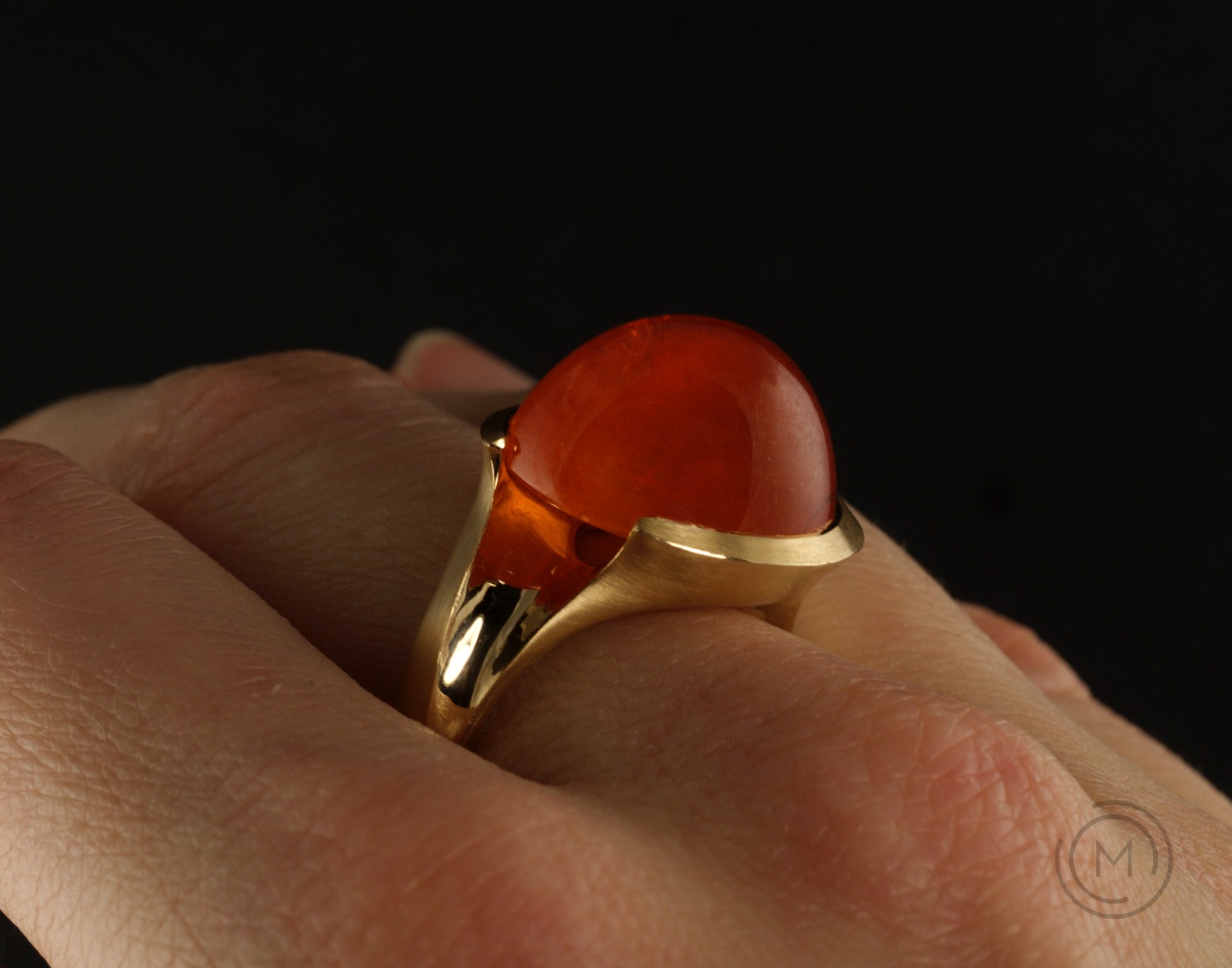 Large Arris cocktail ring with cabochon garnet