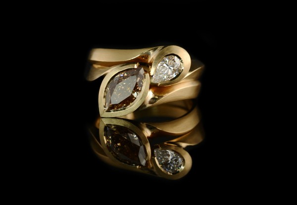 Hand carved rose gold dress ring set with pear and marquise diamonds