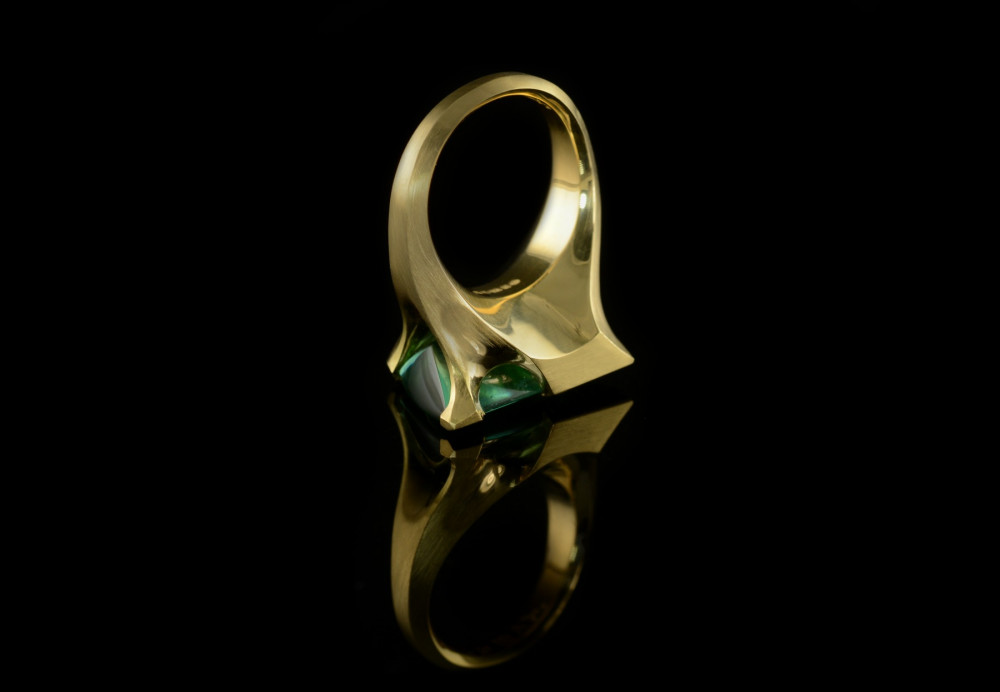 Hand carved gold cocktail ring with fancy-cut green tourmaline