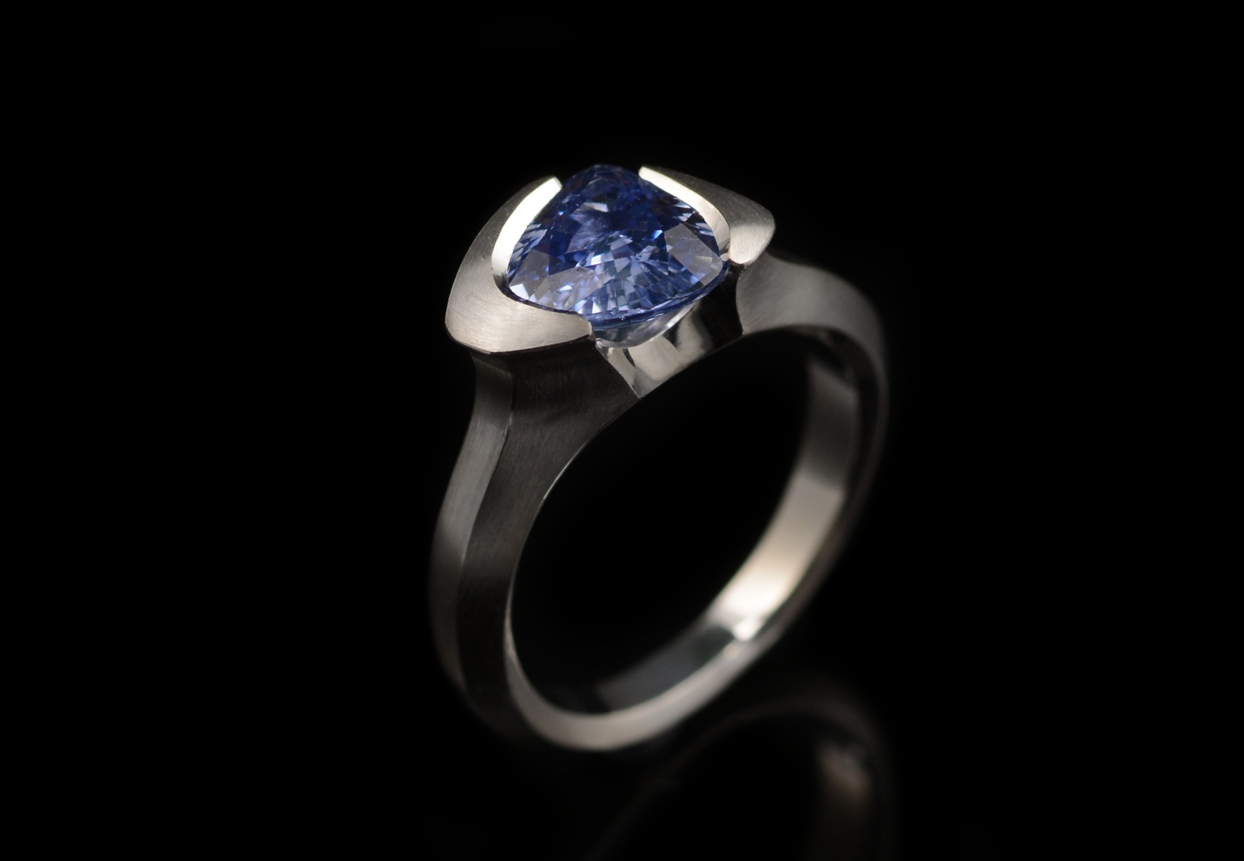 Hand carved platinum and trillion sapphire cocktail ring