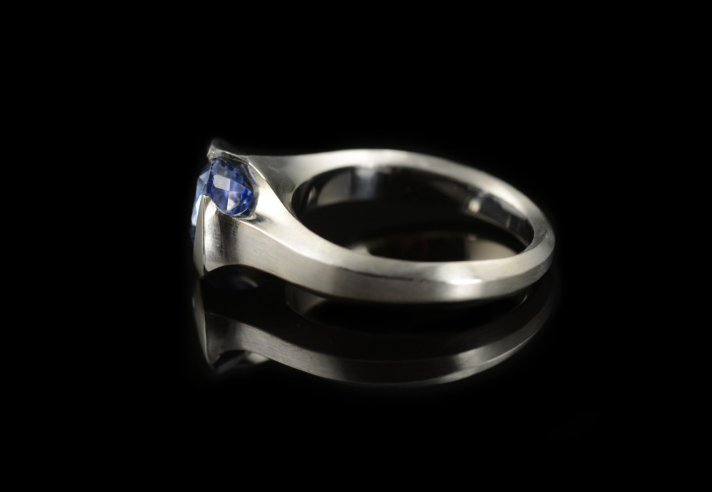 Hand carved platinum and blue trillion sapphire cocktail ring