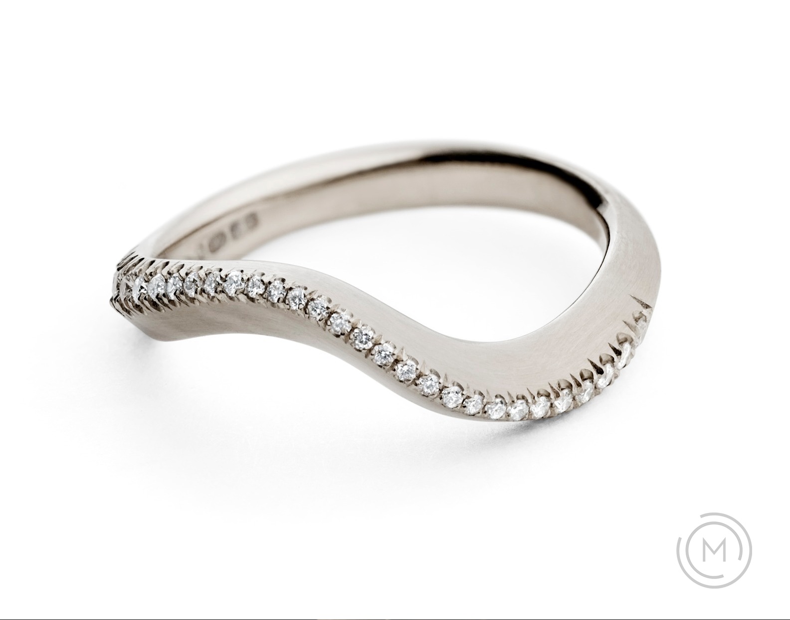Carved white gold and diamond combined engagement and wedding ring