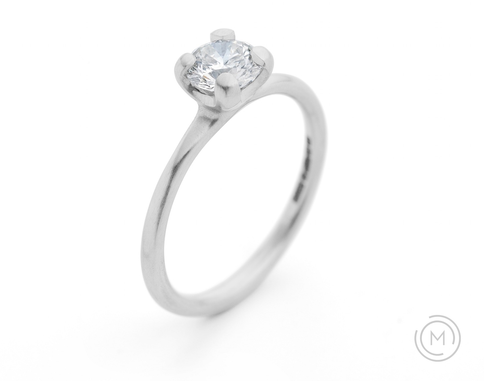 Contemporary white diamond solitaire engagement ring