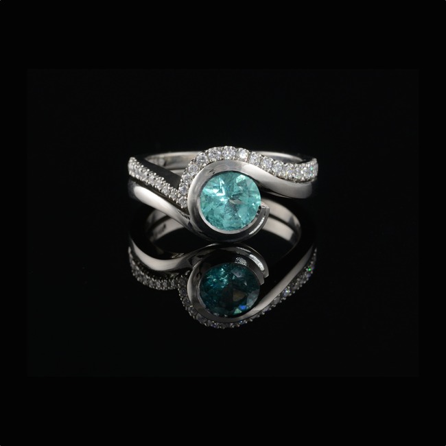 Contemporary engagement ring with coloured stone