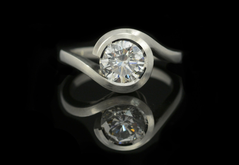 Contemporary engagement rings platinum wave
