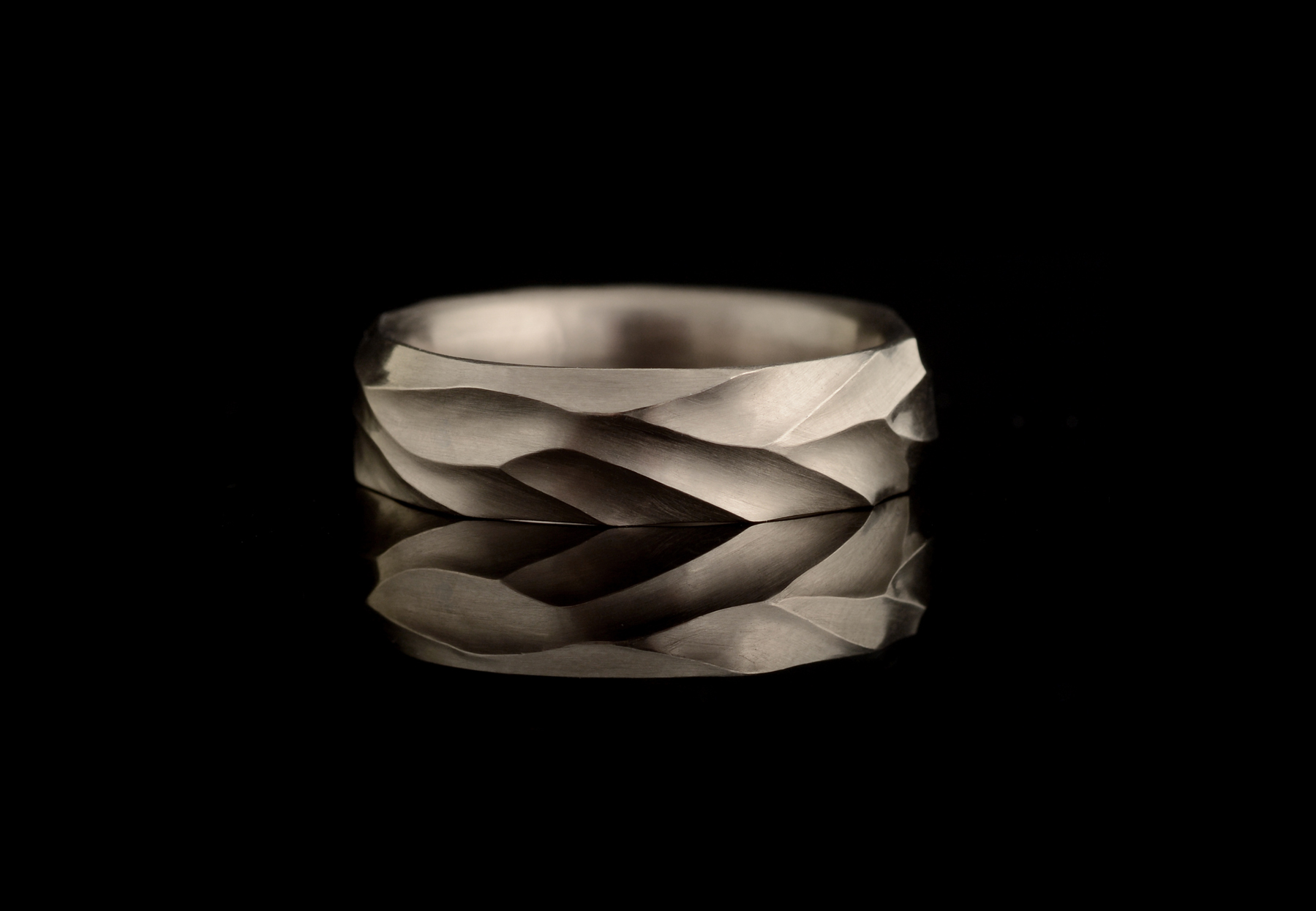 Dune textured hand-carved wedding band in 18ct white gold