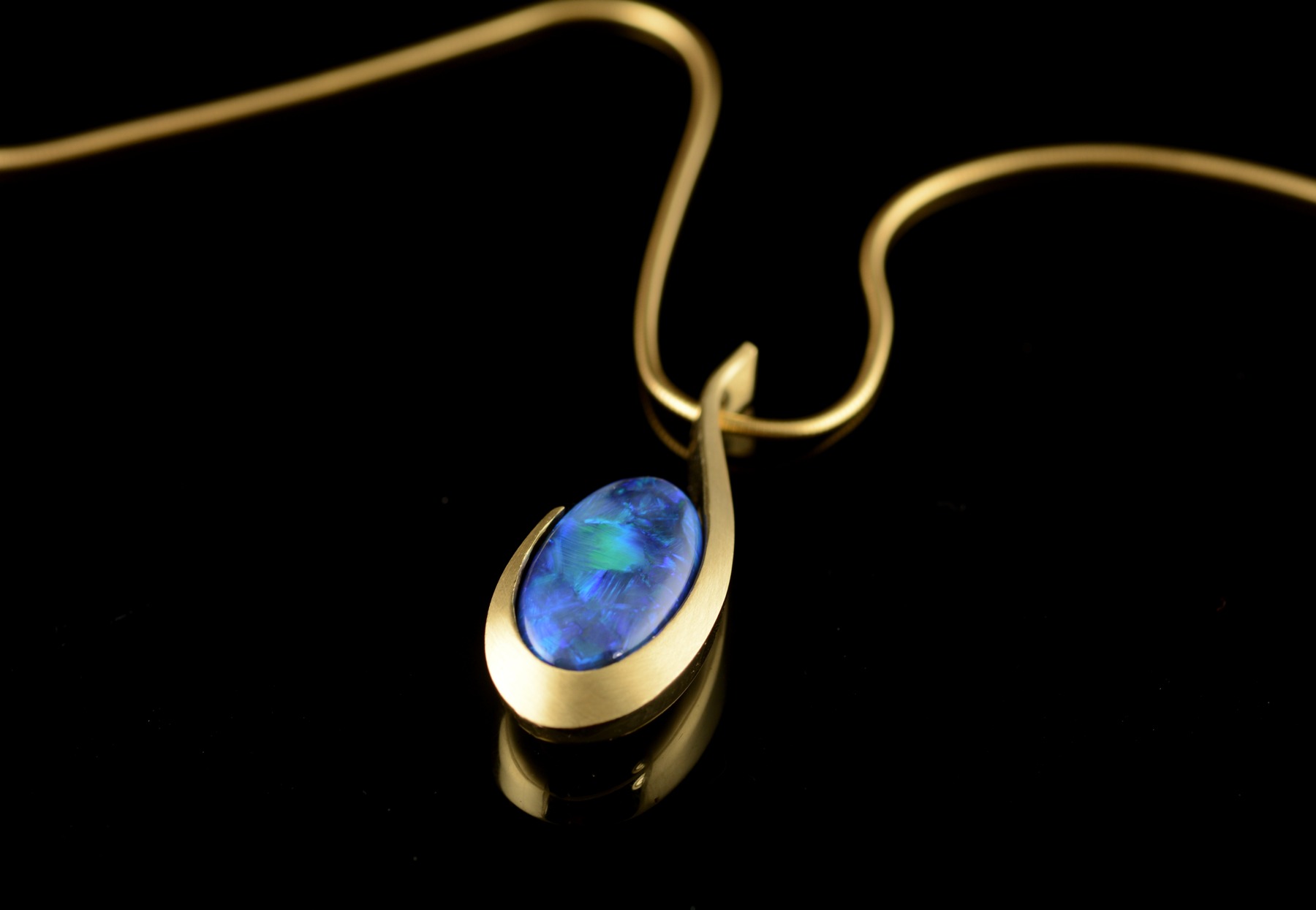 Hand carved yellow gold and Australian opal pendant