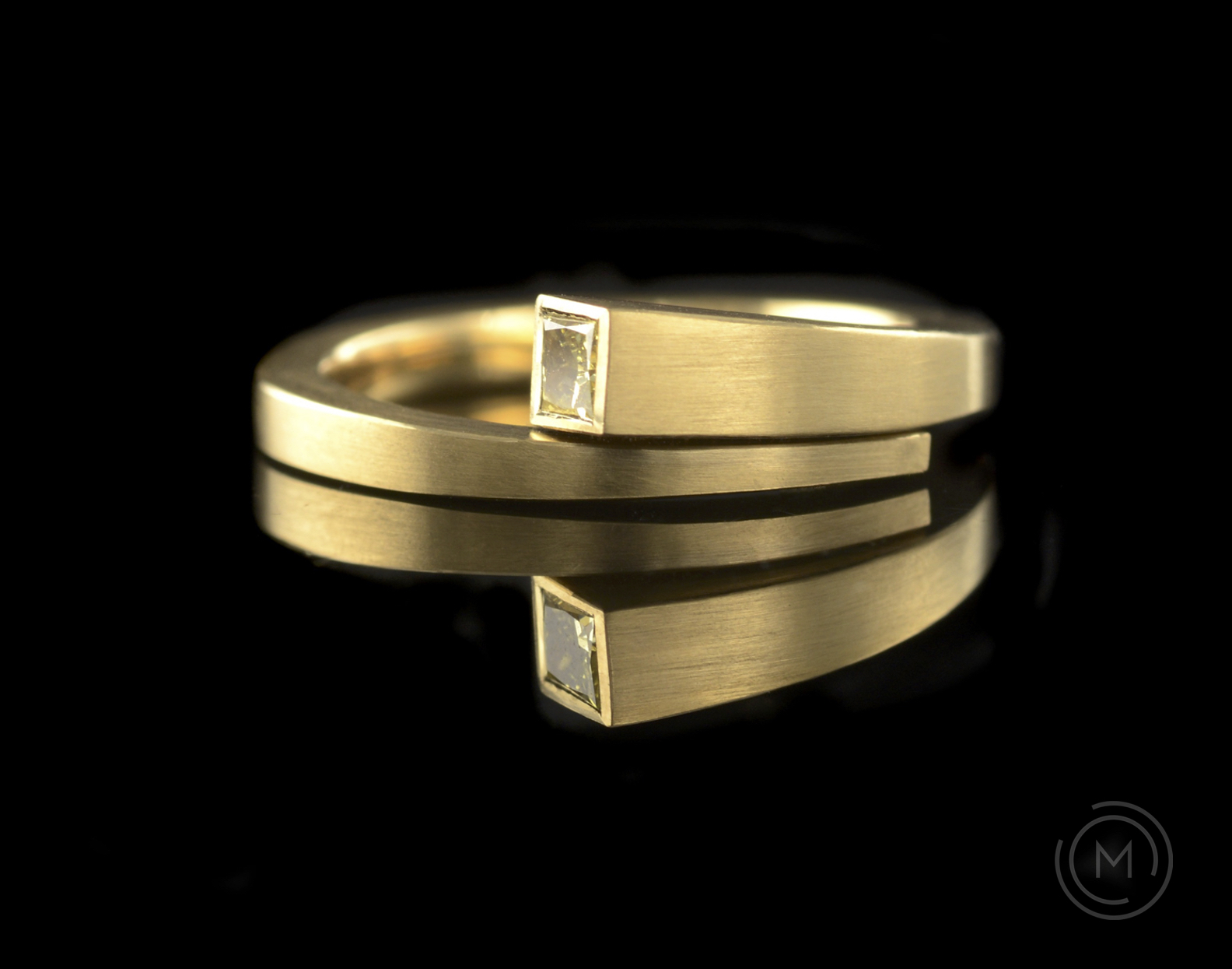 Modern 'Overlap' diamond engagement ring hand-forged from yellow gold and set with a princess cut yellow diamond