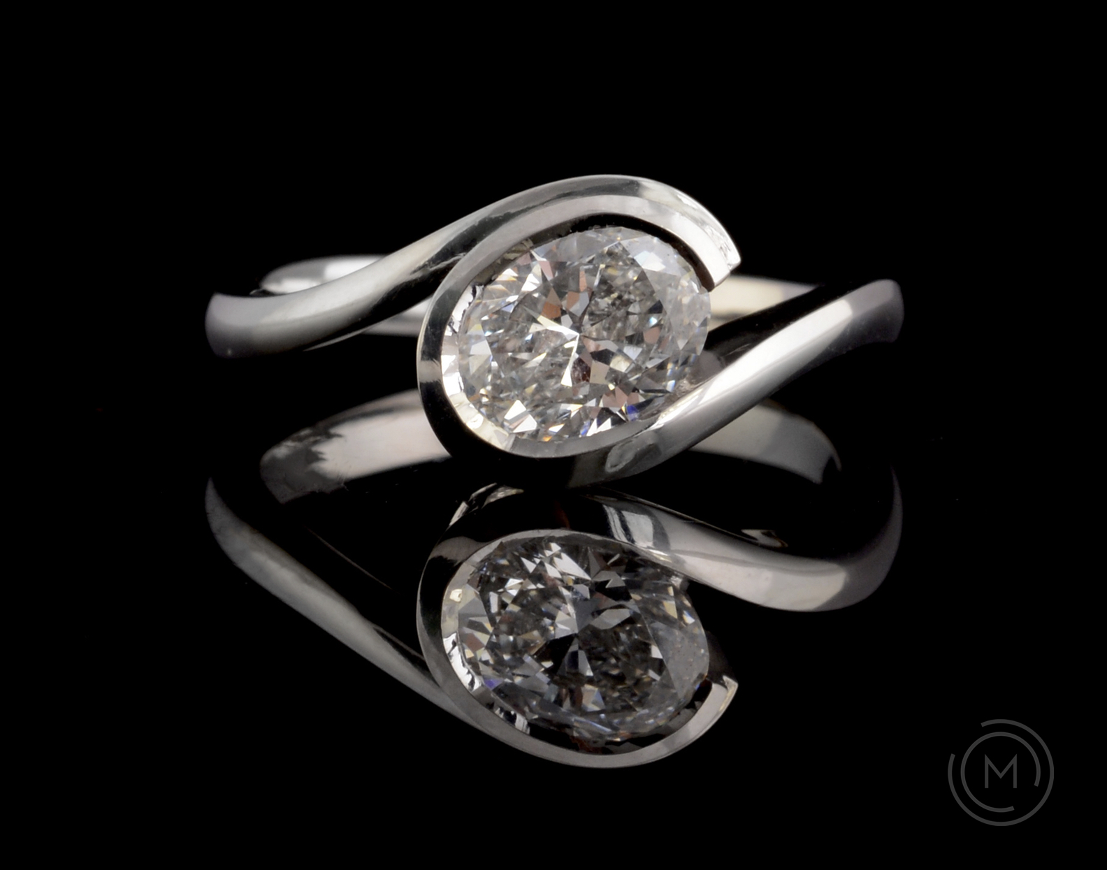 Modern oval diamond 'Wave' engagement ring