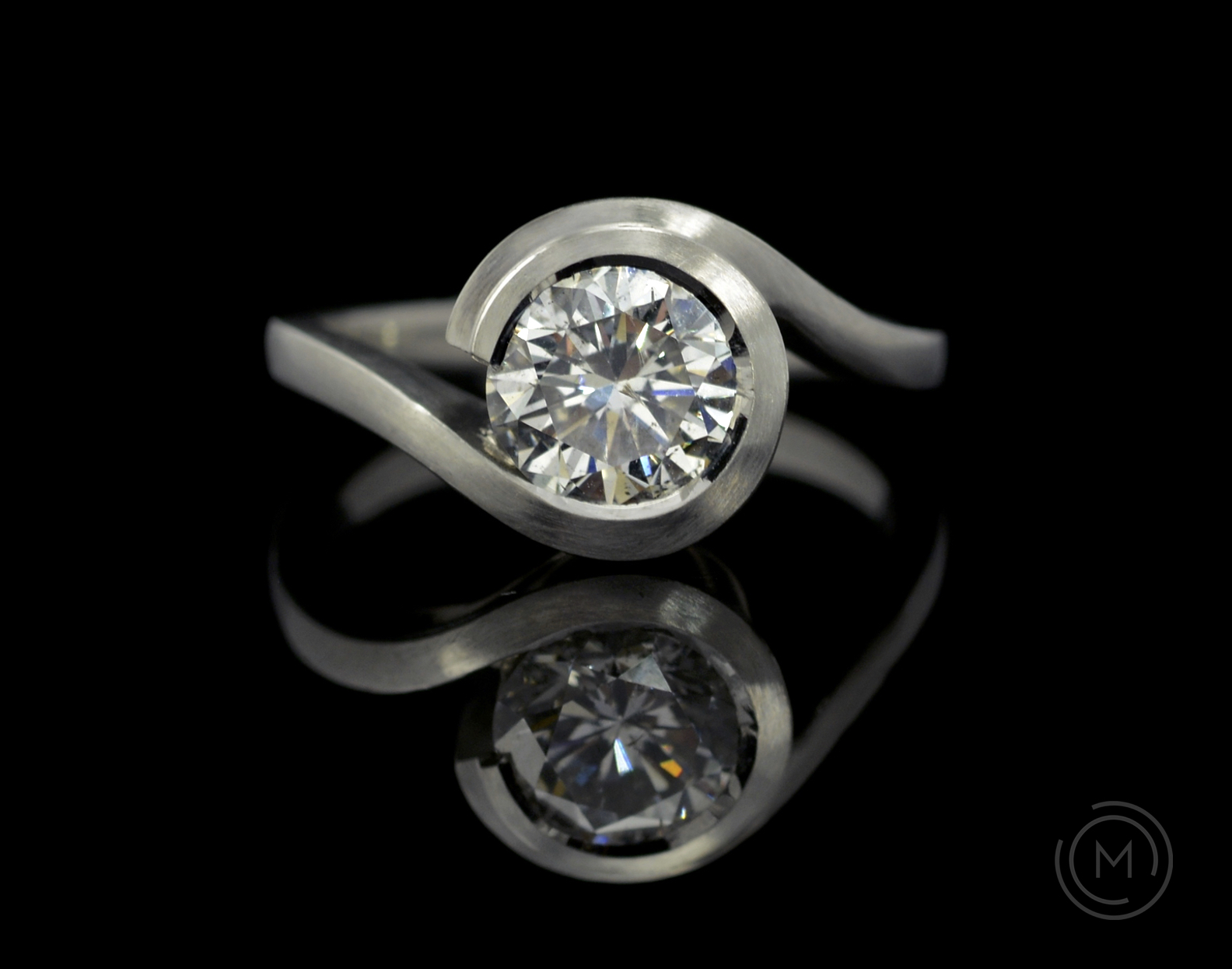Modern platinum and diamond Wave engagement ring