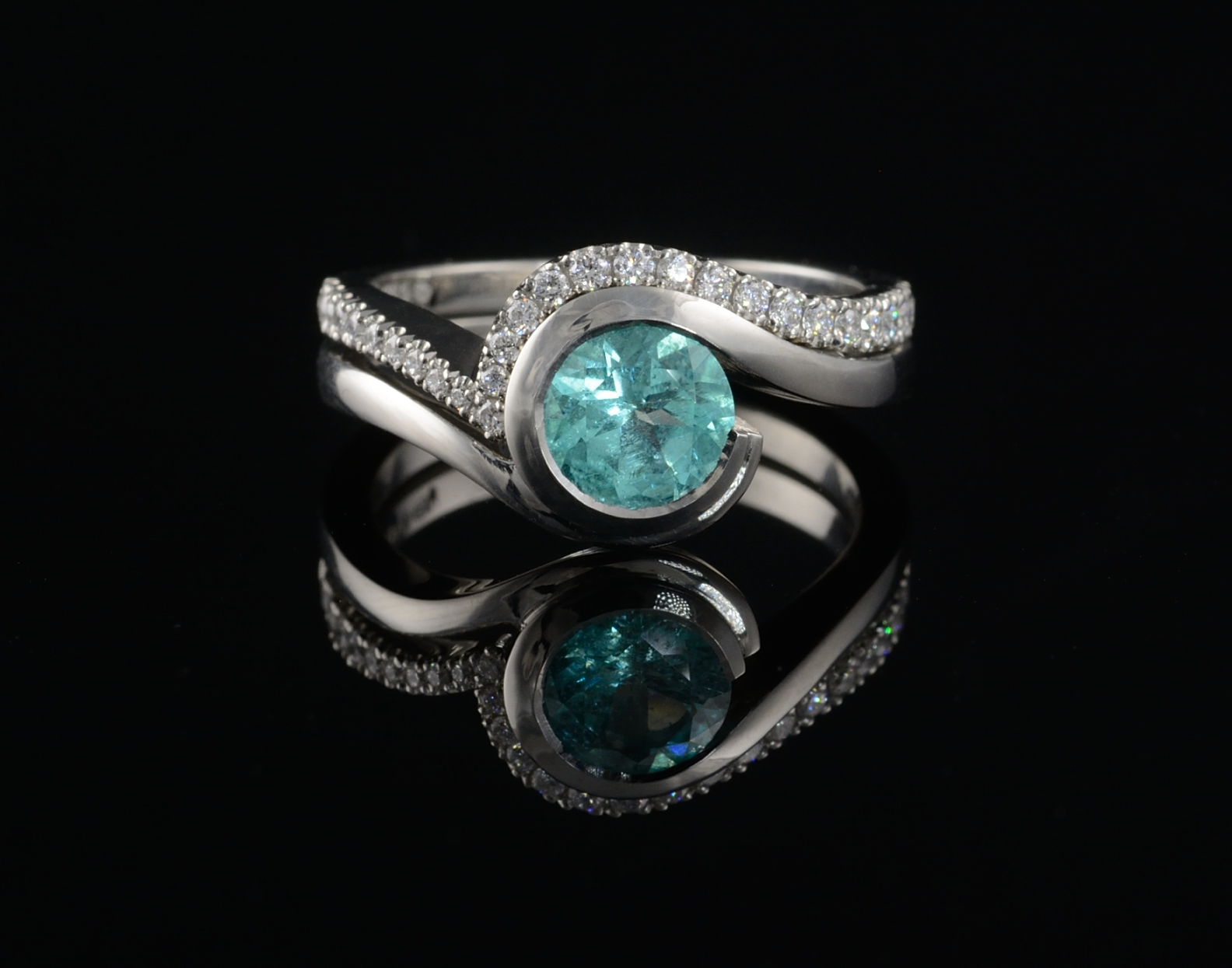 Paraiba and platinum engagement ring and fitted wedding ring
