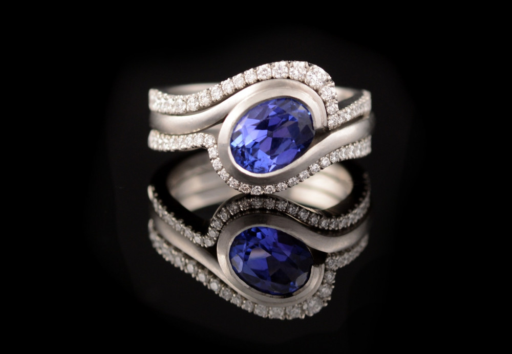 Tanzanite ring with fitted diamond bands