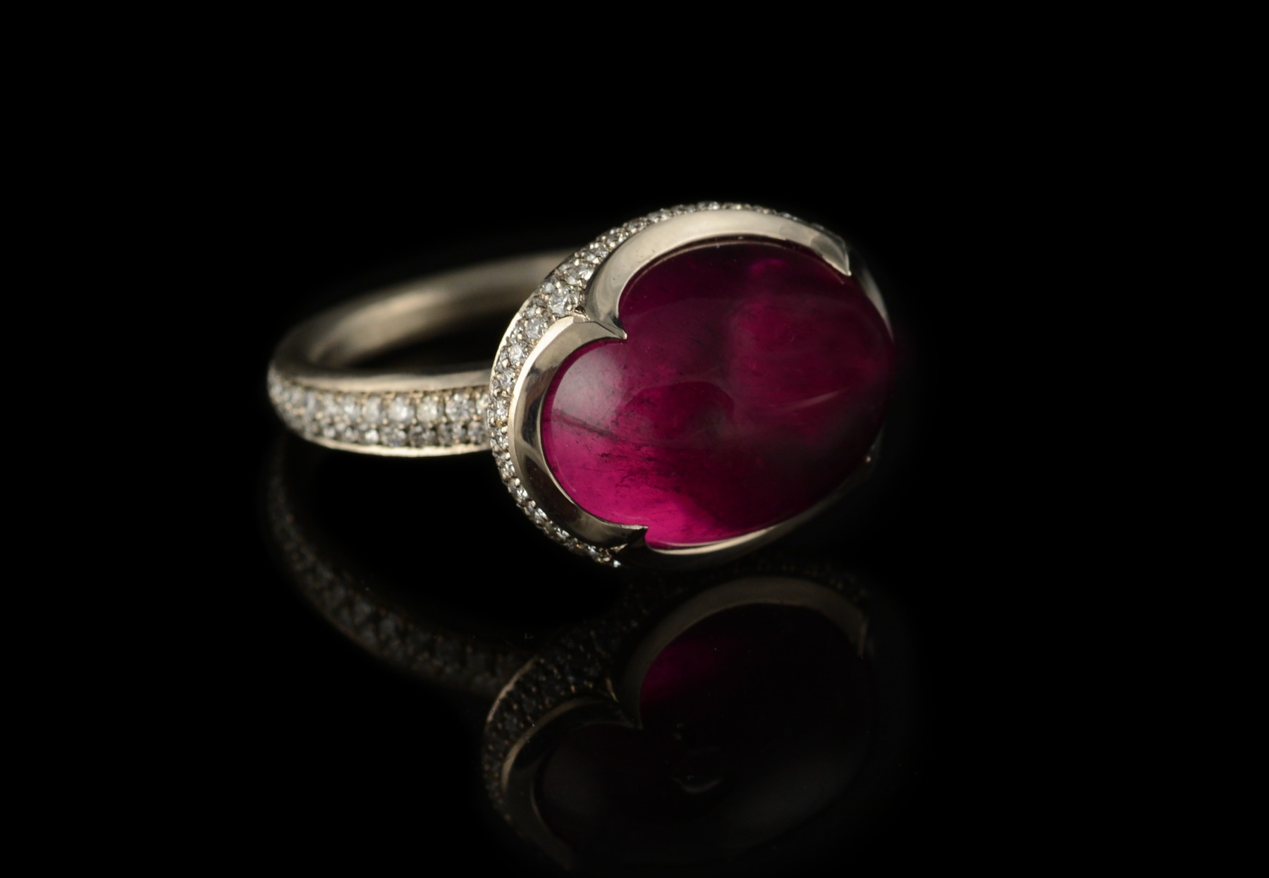 Pink tourmaline and white gold cocktail ring with pave white diamonds