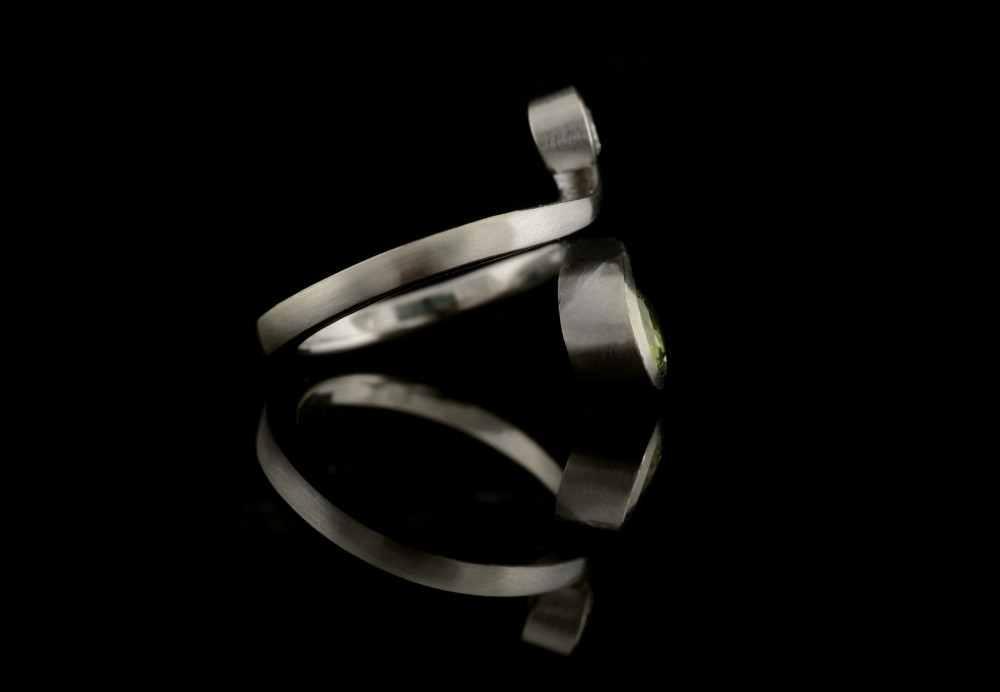 Platinum Twist engagement ring with demantoid and diamond