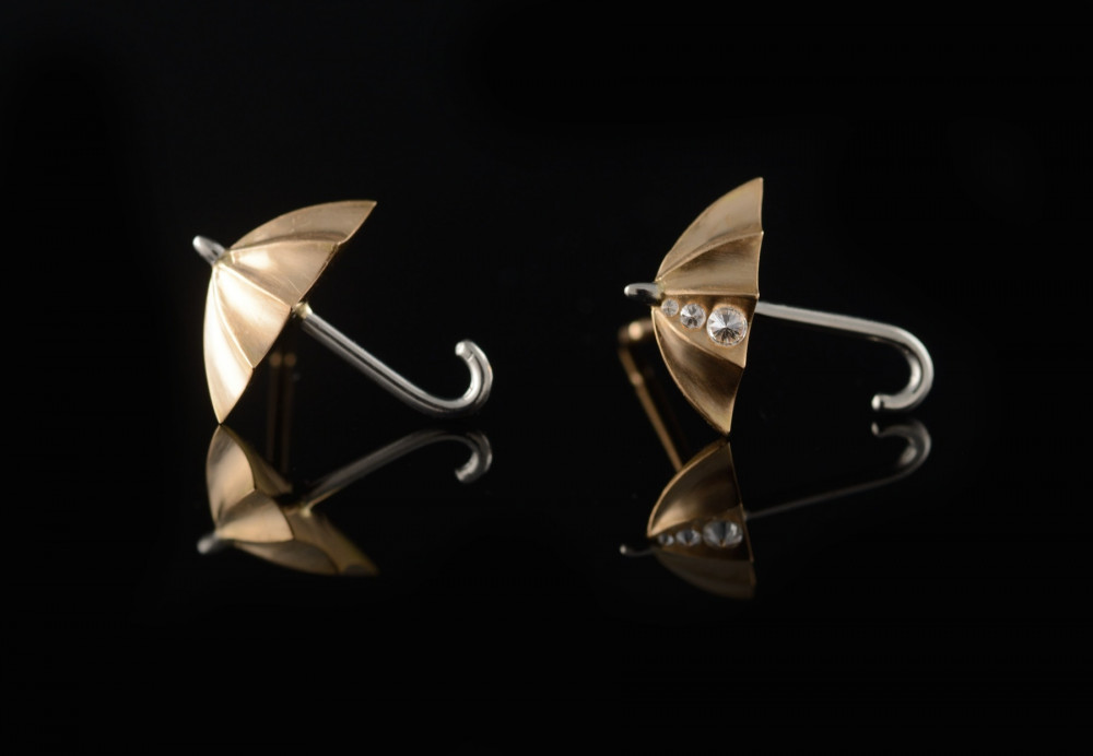 Rose gold umbrella stud earring ready to be set with diamonds