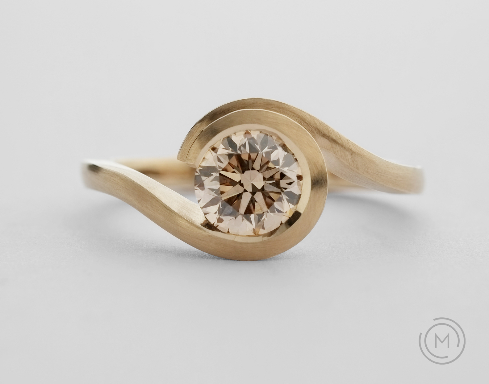 Unusual rose gold engagement ring with cognac coloured diamond