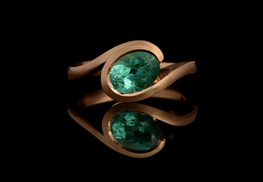 Oval Paraiba tourmaline and rose gold Wave engagement ring commission
