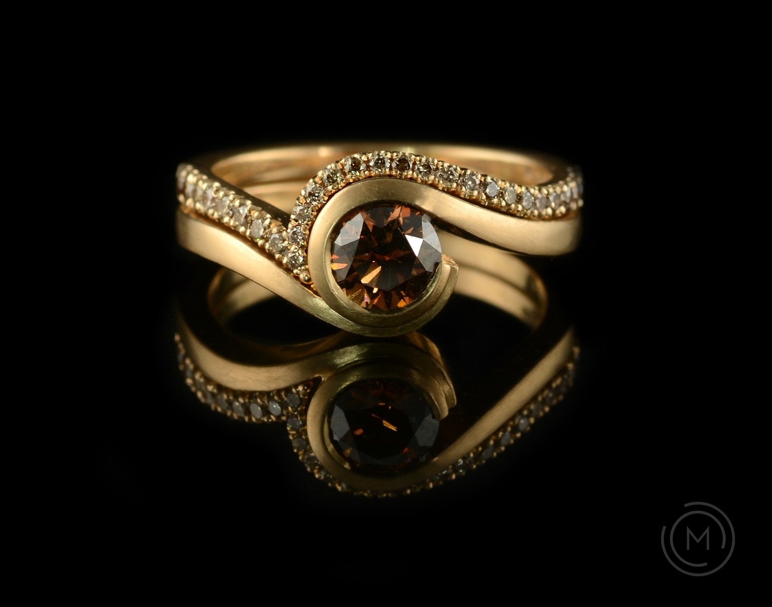 Wave fitted wedding ring made from 18 carat rose gold and cognac diamonds
