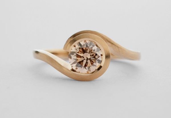 Modern rose gold engagement ring with cognac diamond - the Wave engagement ring is inspired by the form of a breaking wave