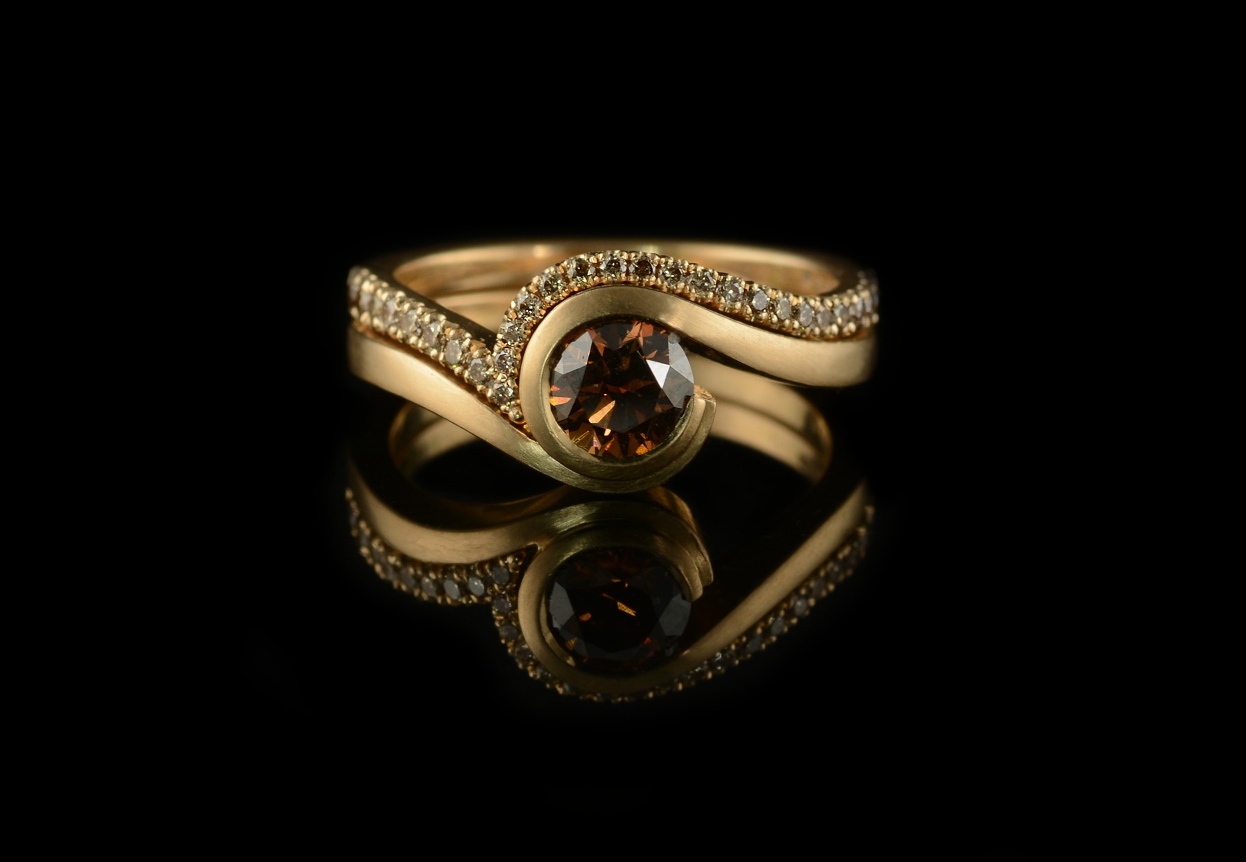 Rose gold engagement ring with cognac diamond and matching fitted wedding band