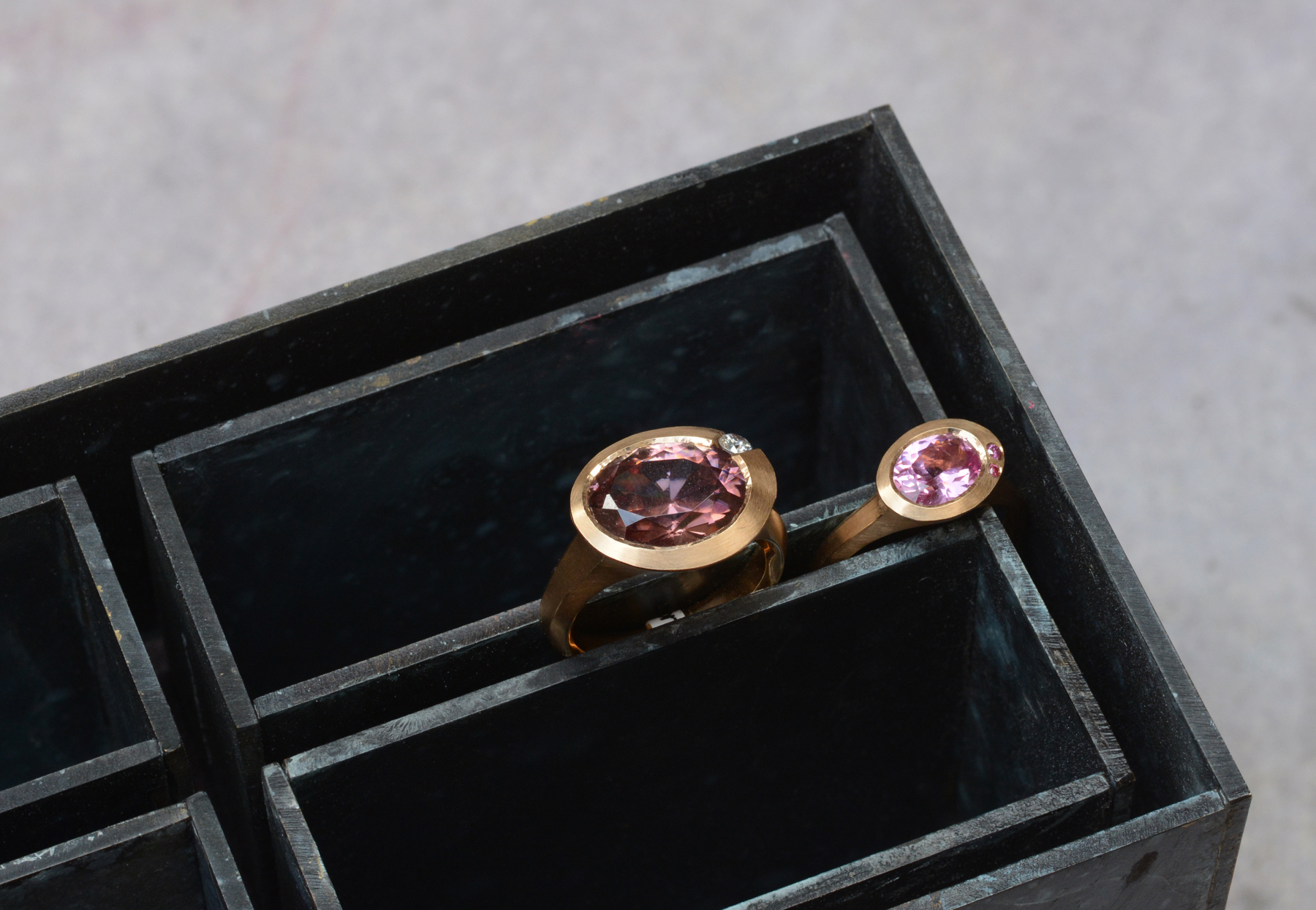 Arris cocktail rings in rose gold with pink and purple stones and pink diamonds