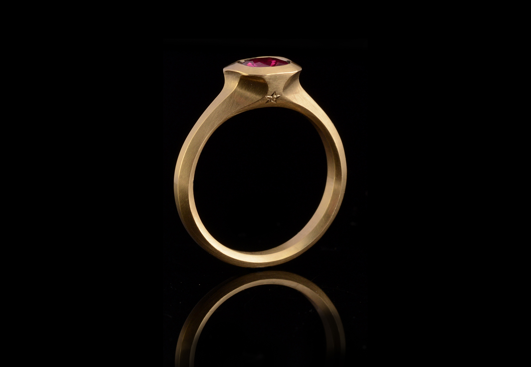 Arris ruby and yellow gold engagement ring
