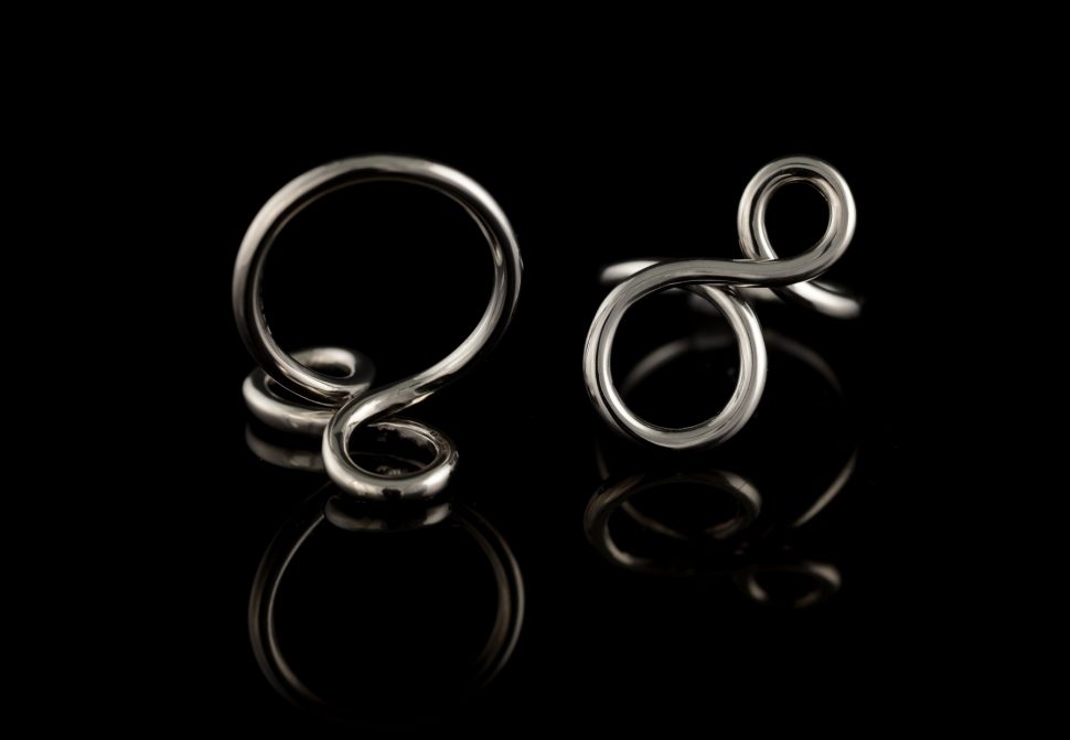 Asymmetric 18 carat white gold wire figure of eight cocktail ring