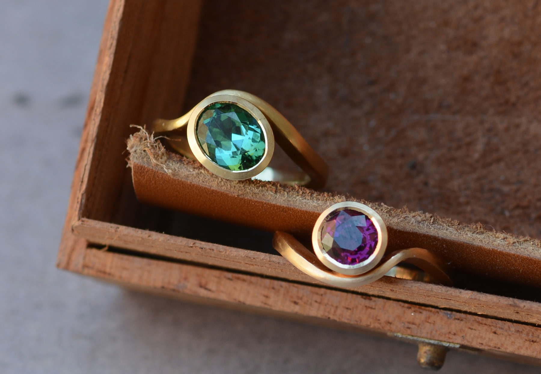 18-carat gold Balance rings set with brightly coloured gemstones