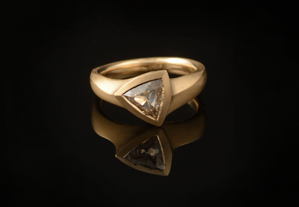 Carved rose gold and diamond ring