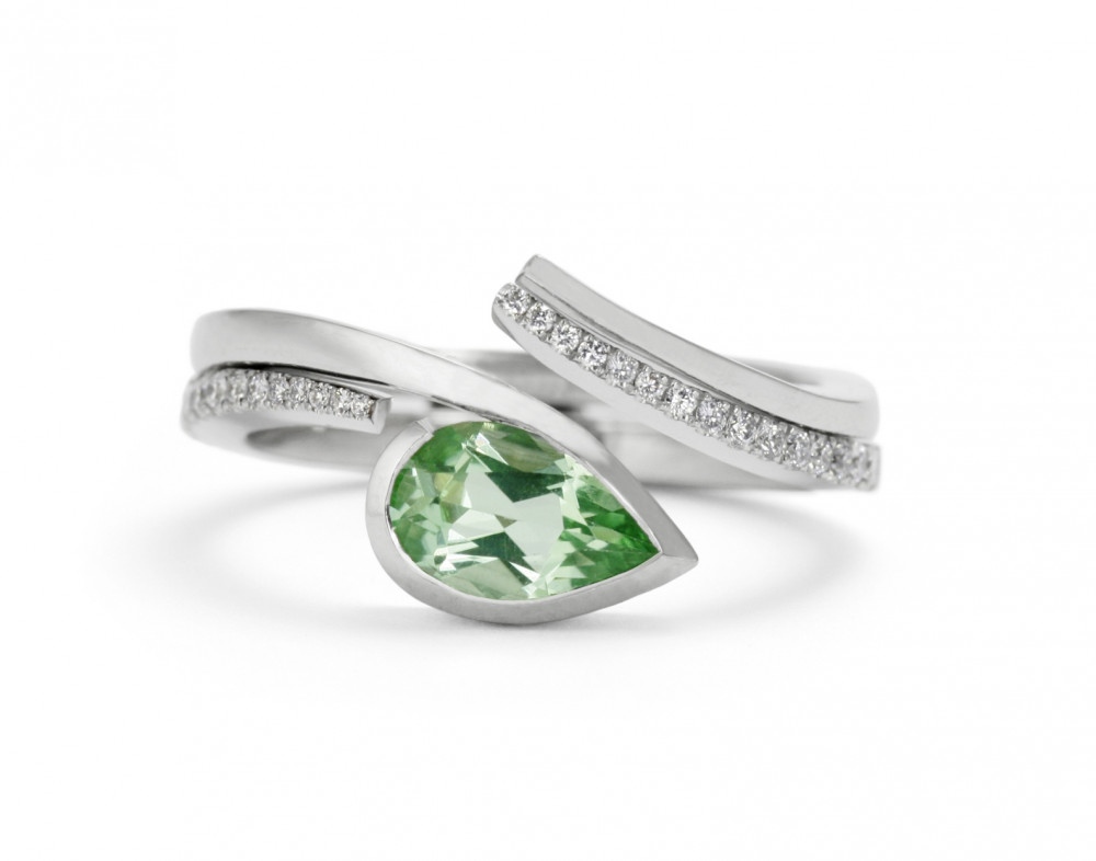 Green coloured stone engagement ring