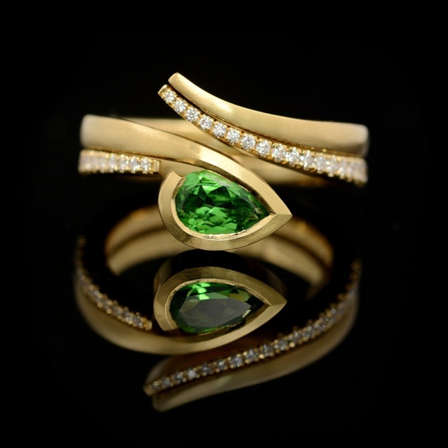 Coloured gemstone engagement ring with blue tourmaline and white diamonds