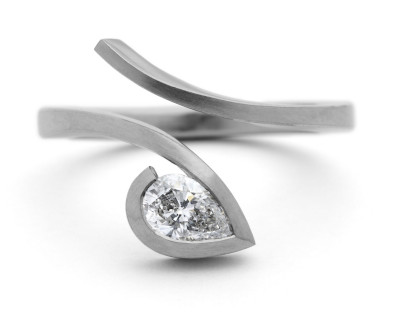 ‘Twist’ platinum engagement ring with pear shaped diamond