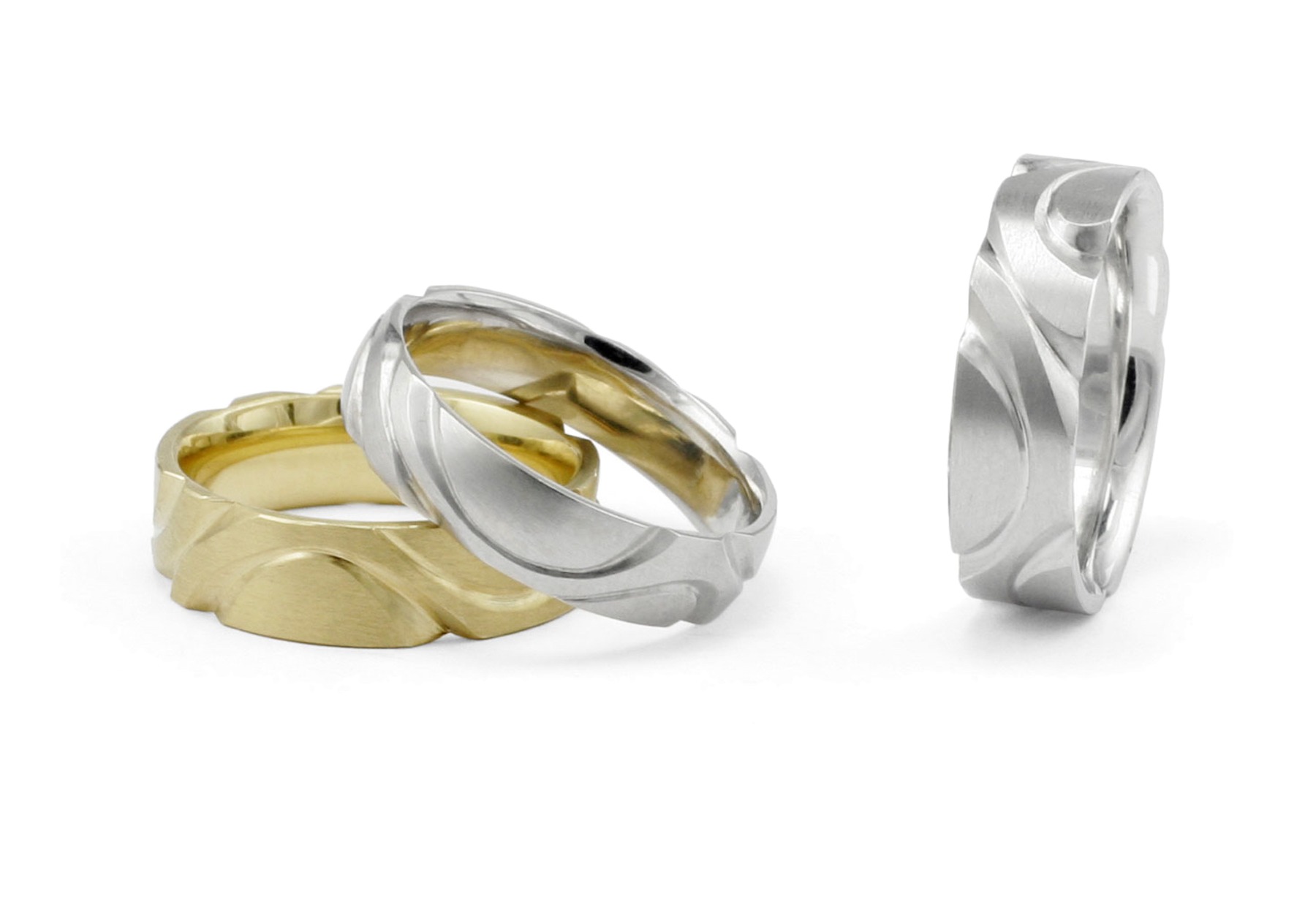 Hand carved platinum and yellow gold men's wedding rings