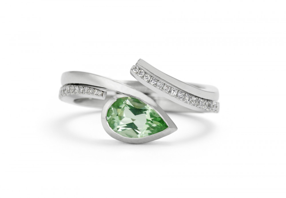 unusual coloured green pariaba tourmaline and diamond engagement and wedding ring set