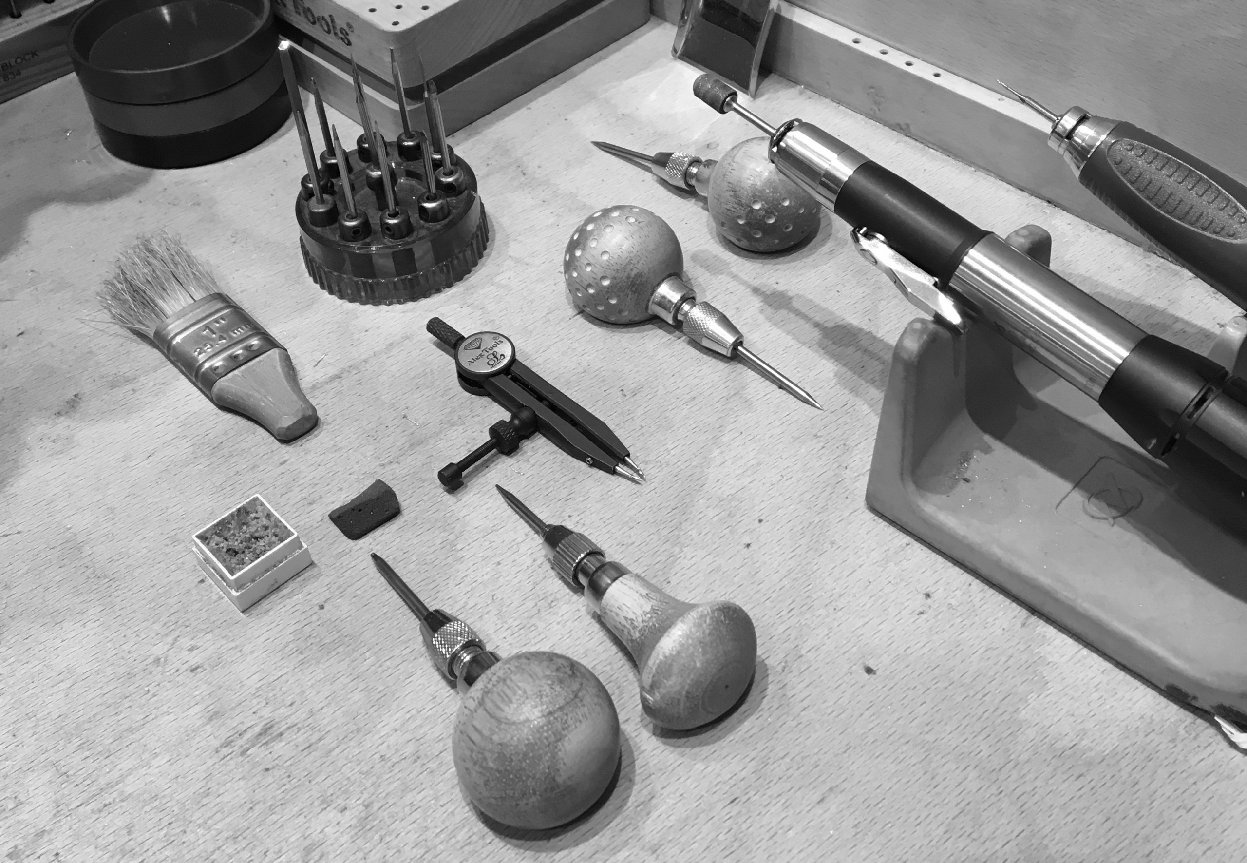 Jeweller's diamond setting tools on workbench